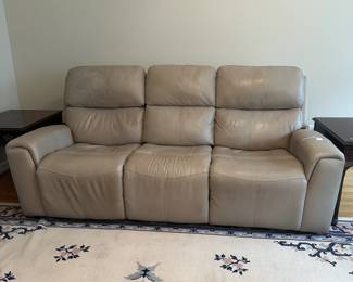C15 - $350 - Flexsteel Industries Power Reclining & Adjustable head sofa. Leather & Faux Leather mix. Measures 85.5" long x 41" tall x 40" deep. 