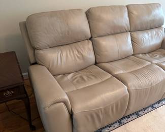 C15 - $350 - Flexsteel Industries Power Reclining & Adjustable head sofa. Leather & Faux Leather mix. Measures 85.5" long x 41" tall x 40" deep. 