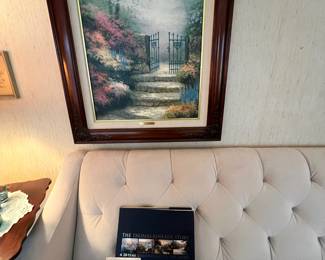 Framed Print "Brookside Hideaway" by Thomas Kinkade, White Upholstered Tufted Back Sofa