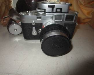 Camera collection including Leica (Leica with additional lens)