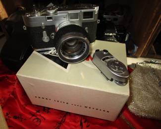 Leica with additional lens and more