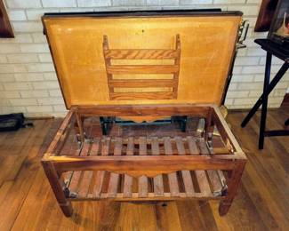 Unusual tilt top table