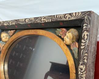 Vintage carved wood angel motif accent mirror