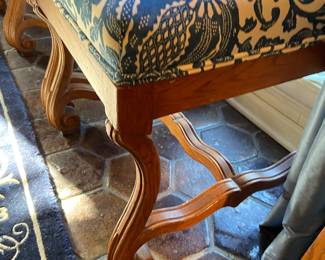Blue & White upholstered dining chairs with carved wood accents from The Merchandise Mart; (6 armless, 2 arm)