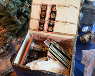 Antique magic lantern projector with glass slides