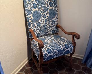 Blue & White upholstered dining chairs with carved wood accents from The Merchandise Mart; (6 armless, 2 arm)
