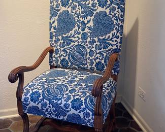 Blue & White upholstered dining chairs with carved wood accents from The Merchandise Mart; (6 armless, 2 arm)