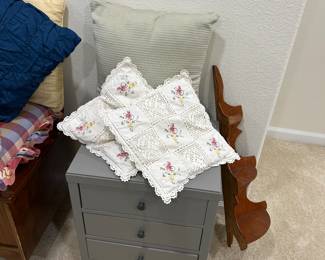 Nightstand 
Pillows 