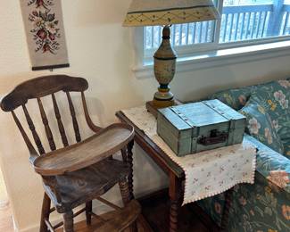 Antique high chair 
Side table 
Lamp