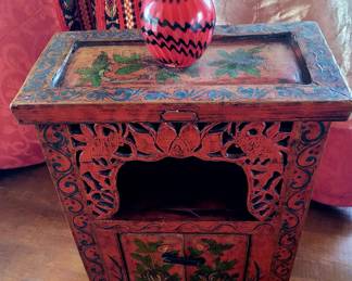 Small carved and painted folk art cabinet