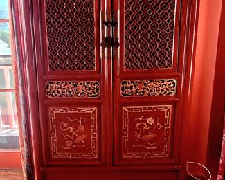 Red lacquer Chinese pierce carved cabinet-circa 1880