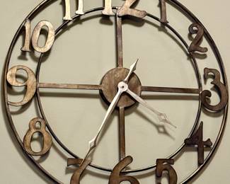 Another Unique Wall Clock in Brass Colored Metal