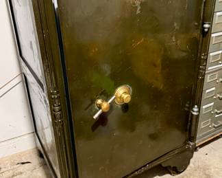 Antique Safe with Brass Mechanism.  On Wheels but very Heavy and in the Garage.