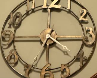 Another Unique Wall Clock in Brass Colored Metal