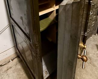 Antique Safe with Brass Mechanism.  On Wheels but very Heavy and in the Garage.