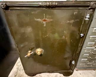 Antique Safe with Brass Mechanism.  On Wheels but very Heavy and in the Garage.