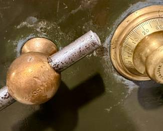 Antique Safe with Brass Mechanism.  On Wheels but very Heavy and in the Garage.