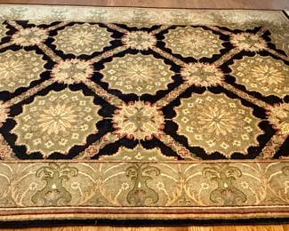 Beautiful Tan, Black, Green and Taupe Area Rug