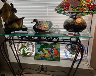 Bronze tone glass top wrought iron table