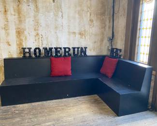 seat people here. two large left and right L shaped benches. they could be configured together for one giant U shaped unit