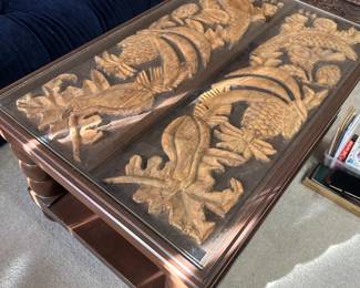 Carved wood coffee table