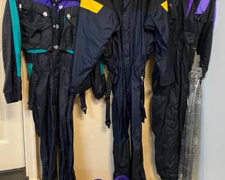 3 NICE Ski Suits and pair of Ski Boots.