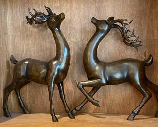 Pair of sculptured deer.