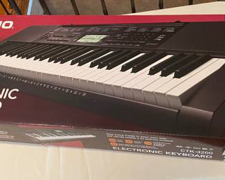 UNUSED new in the box CTK-3200 Casio Electric Keyboard. 