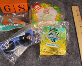 Lot 68:  Sale $4.  Was $8.  Group of 4 McDonald's toys still packaged.