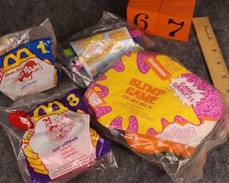 Lot 67:  Sale $4.  Was $8.  Group of 4 McDonald's toys still sealed including Hip Hippos and Space Jam