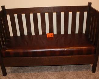 Lot 58:  Sale $750.  Was $825.  Mission oak settee in exc condition