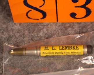 Lot 83:  Sale $3.  Was $6.  Bullet pencil, H.L. Lembke, McCormick-Deering farm implements, Indian gas