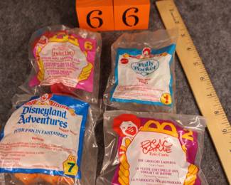 Lot 66:  Sale $4.  Was $8.  Group 4 sealed McDonald's toys including Peter Pan #6 and #7