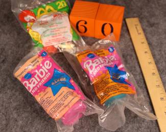 Lot 60:  Sale $5.  Was $10.  Three Barbie McDonald's still in package