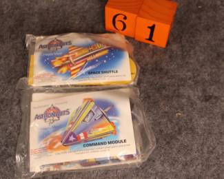 Lot 61:  Sale $4. Was $8.  McDonald's astronauts, shuttle and command module, still sealed