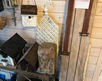Rustic wood shelf by Ballard Designs (right in photo, unassembled); collection of fun and interesting birdhouses.