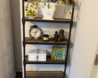 Five-tier industrial pipe shelf; interesting quality home decor sale-wide.