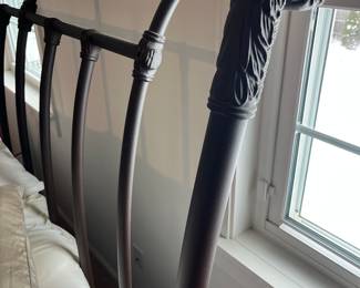 Closer look at metal headboard for queen bed.