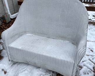 Lloyd Flanders wicker loveseat.