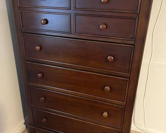 Five-drawer vertical dresser.