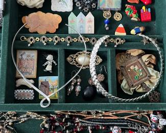 Costume jewelry and wrist watches.