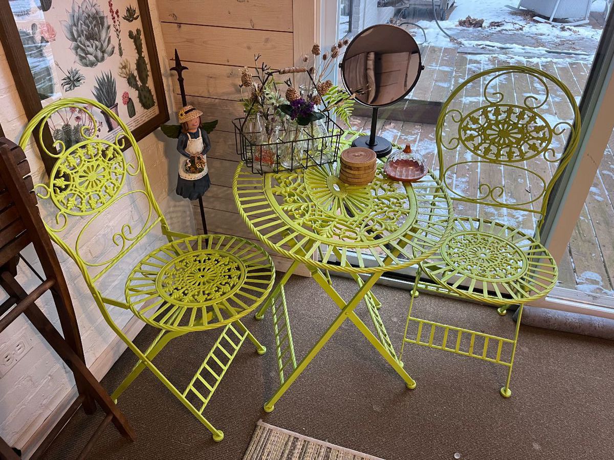 Three-piece metal outdoor bistro/dining set.