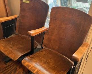 Texas movie theater seats with star design in seats and heavy metal base.