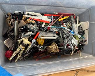 Lots of weapons and figures of Star Wars