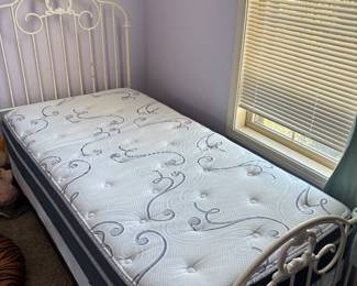Cute wrought iron bed with nice mattress