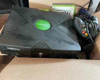 XBox 360 with 4 game controllers & 4 games $80