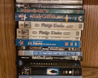 Movie Collection (Tapes & DVDs): The Woody Woodpecker & Friends Classic Cartoon Collection; Leave It to Beaver: The Complete Second Season; The Twilight Zone: Season 1: Unbreakable; The Addams Family; The Best of Fractured Fairy Tales Vol. 1; Jeff Corwin Out on A Limb: Monkeys, Orangutans & More!; The World of Sid & Marty Krofft H.R. Pufnstuf Complete Series; The Andy Griffith Show: The Complete Second Season; A Christmas Story; Fingersmith; The Bicycle Thief; Hysteria