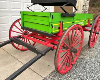 CLOSEUP VIEW WOODEN SPOKE WHEELS