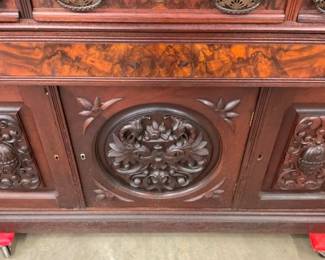 HEAVILY CARVED W/ CHOC. MARBLE