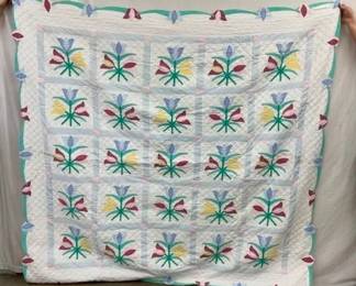 EARLY HANDMADE QUILT W/ FLOWERS